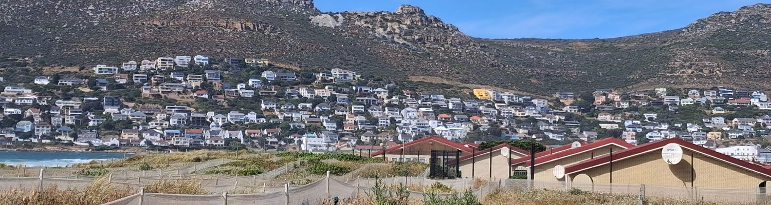 View of Seaside Cottages from Fish Hoek Beach