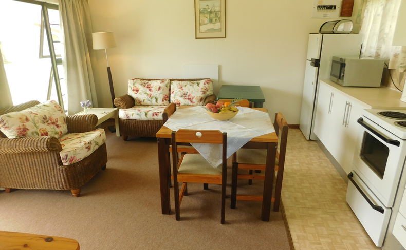 Lounge area of cottage 23 - Seaside Cottages Fish Hoek Lounge area of cottage 23 - Seaside Cottages Fish Hoek