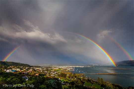 Double rainbow, Knysna Lagoon.  Actual view from Paradise Found. Photo by Chris Daly.