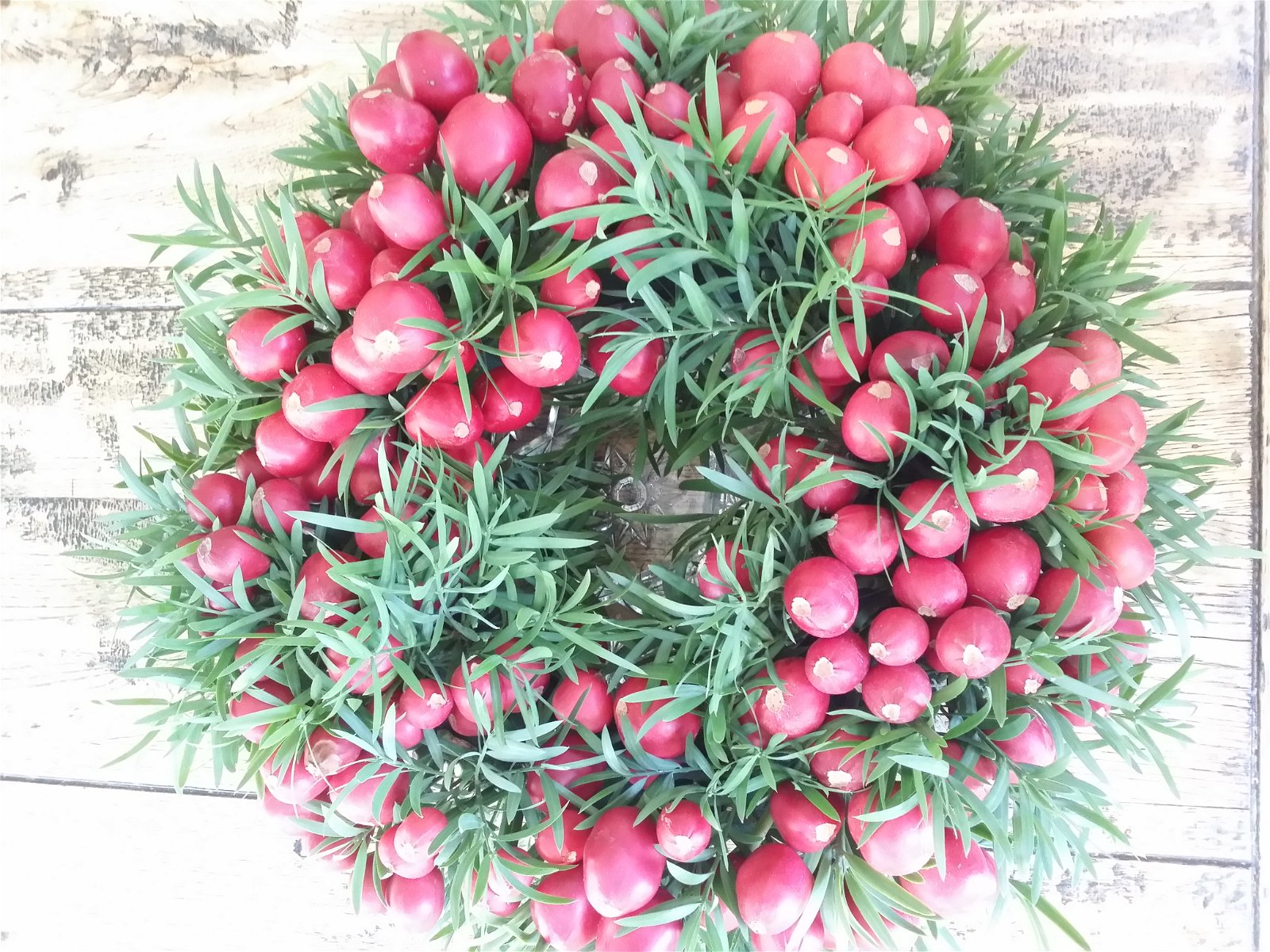 Christmas wreath made from clivia berries and yellowwood twigs.