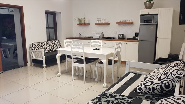 Spacious entertaimnment area, with kitchen ,dinner and bed