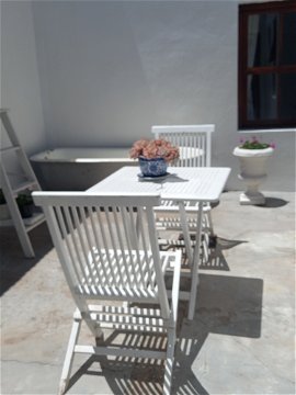 Table for 2 in small courtyard
