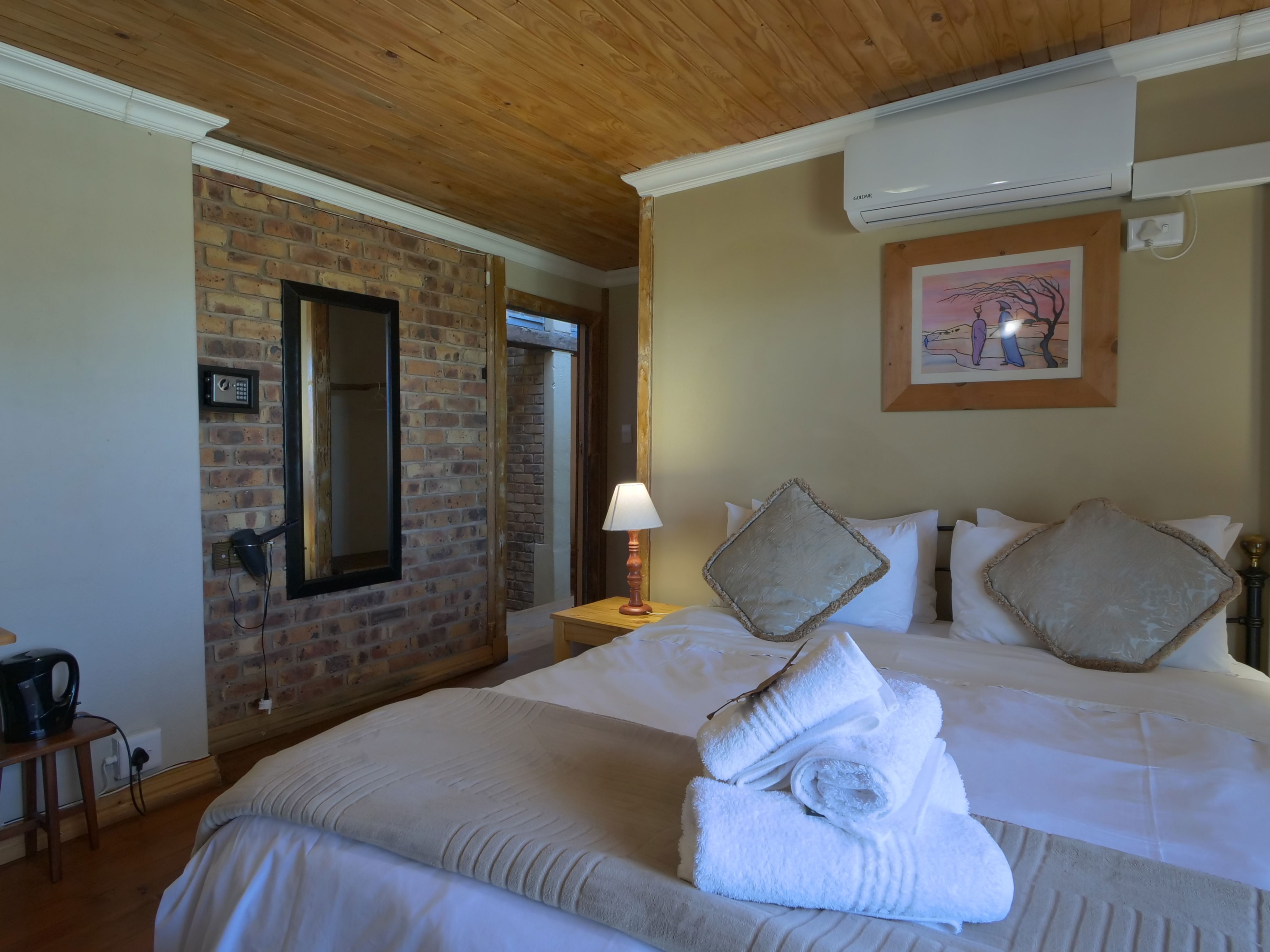 Comfortable room with queen bed for a couple @ The Manor