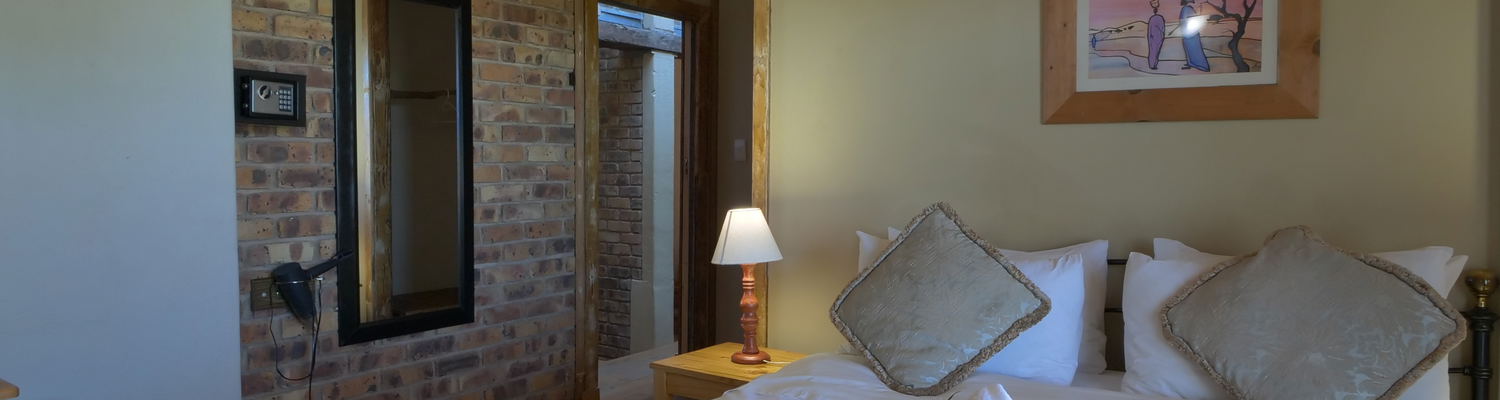 Comfortable room with queen bed for a couple @ The Manor