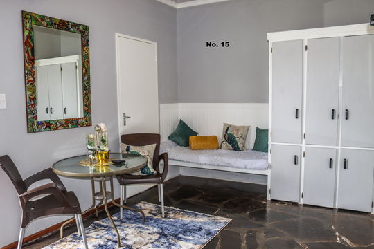 No. 15 Open plan living room with cupboards