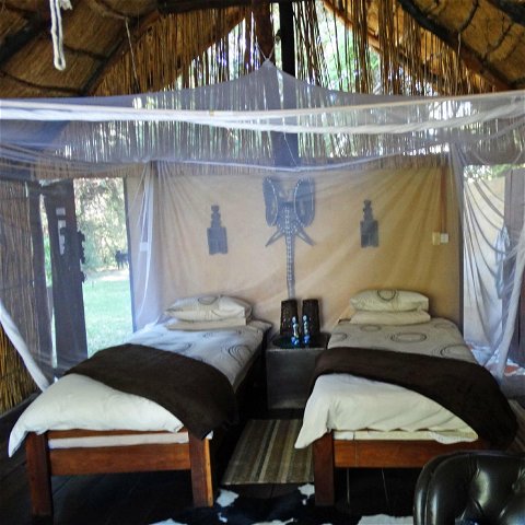 Chalets with twin beds, Caprivi Houseboat Safaris Lodge