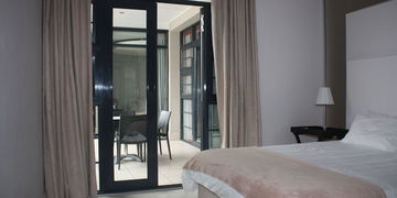 Bedroom, Apartment 905, Apartment 67 on Long Street