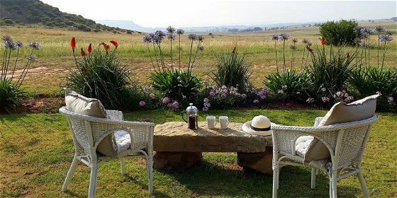 Guinea Fowl Self Catering Cottage with two bedrooms en suite, big open plan living area with huge open fire.