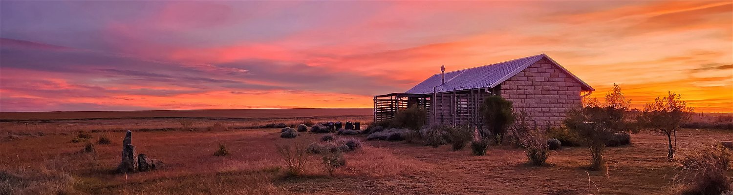Quail Cottage - designed for just two in indulgent luxury and quiet solitude - etched against a magnificent sunset - in the Eastern Free State Highlands