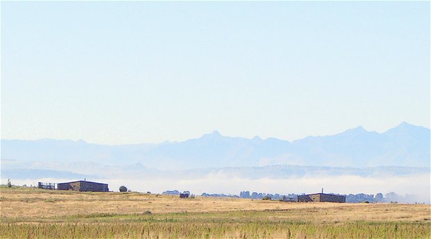 The best getaway in the Eastern Free State, the magnificent view of the Maluti Mountains with Guinea Fowl and Mongoose Cottages in the foreground at Amohela ho Spitskop Country Retreat & Conservancy between Ficksburg & Clocolan in the Eastern Free State