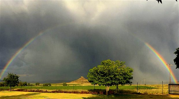 A rainbow covers Amohela ho Spitskop Country Retreat & Conservancy between Ficksburg & Clocolan in the Eastern Free State