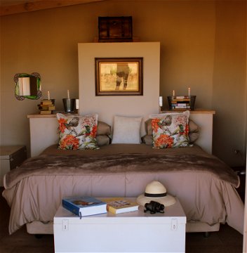 Main bedroom in  Mongoose Self Catering Cottage at Amohela ho Spitskop Country Retreat & Conservancy in the Free State.