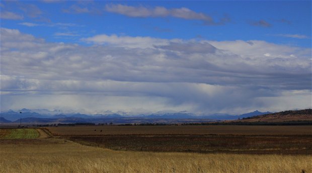 The view of snowy mountains from Amohela ho Spitskop Country Retreat between Ficksburg and Clocolan in the Eastern Free State.