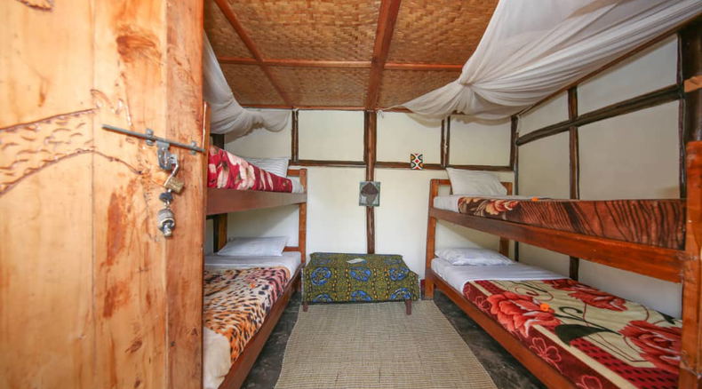Our dorms have 4 beds only in one room with shared bathroom Our dorms have 4 beds only in one room with shared bathroom