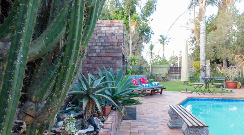 Outdoor swimming pool, garden and sun terrace