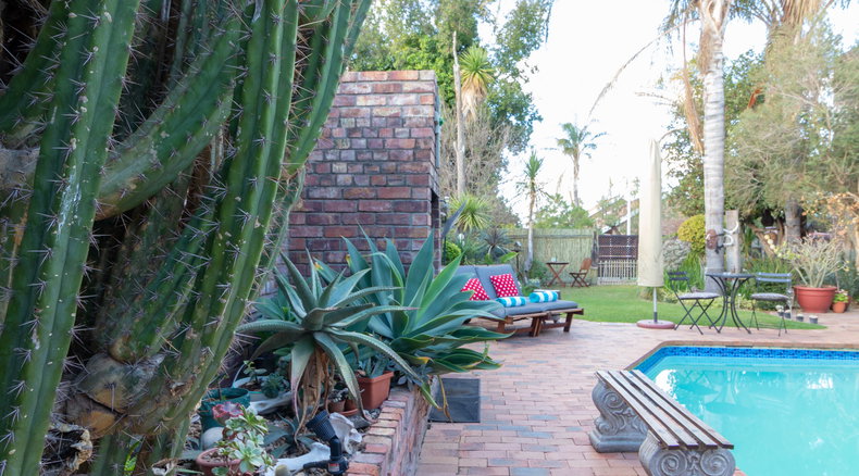 Outdoor swimming pool, garden and sun terrace