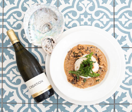 Abalone with coconut flavored jasmine rice, paired with Creation Chenin Blanc