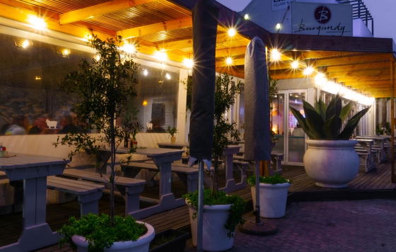 Dinner dining under pergola
