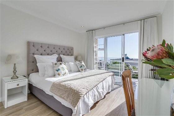 The master bedroom has a king sized bed, hairdryer, safe, ample wardrobe space and leads onto the balcony