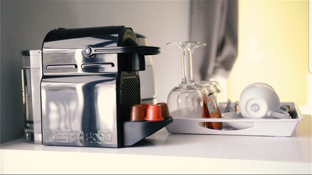 nespresso coffee machine in each room along with free coffee pods daily
