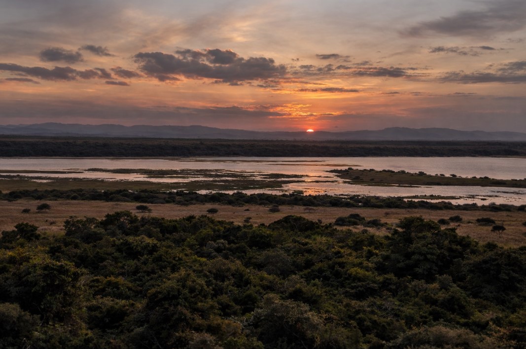 Sunset atmosphere in St Lucia estuary Sunset over the St Lucia estuary with wildlife activity