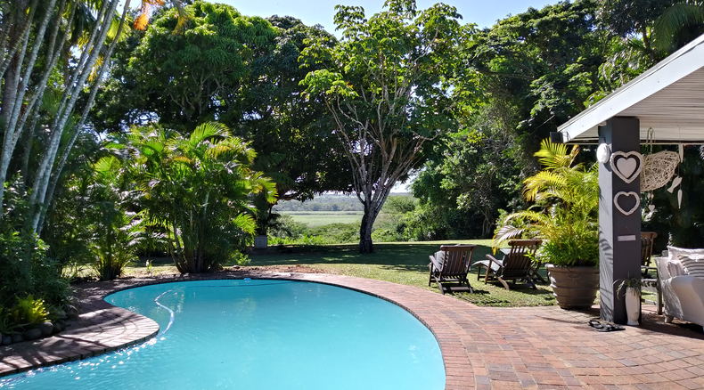 Garden overlooking the St.Lucia Estuary & Pool Area Garden overlooking the St.Lucia Estuary & Pool Area