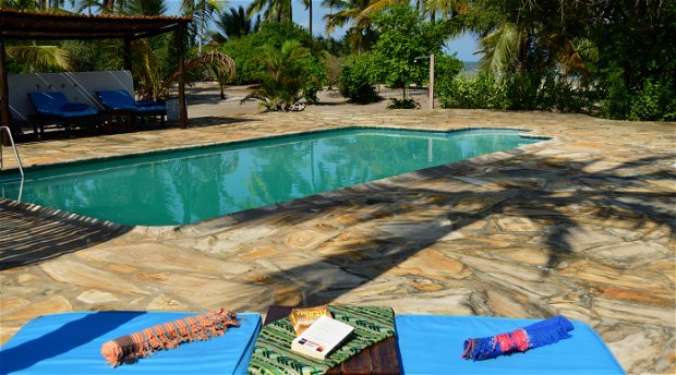 Spend your days relaxing by the pool lulled by the sound of the ocean at Kijongo Bay Resort. Spend your days relaxing by the pool lulled by the sound of the ocean at Kijongo Bay Resort.