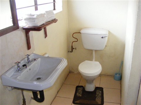 Twin room toilet and hand basin