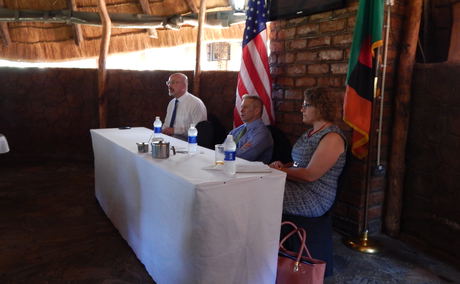 US Ambassador Eric Schultz addressing Americans resident around Livingstone. On his right is Consular Chief Otto H. Westhassel and on his left is Chief of section - Political and Economic Affairs Andrea J. Tomaszewiscz US Ambassador Eric Schultz addressing Americans resident around Livingstone. On his right is Consular Chief Otto H. Westhassel and on his left is Chief of section - Political and Economic Affairs Andrea J. Tomaszewiscz