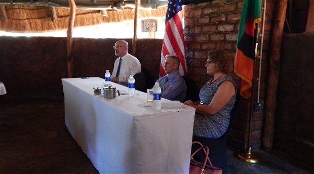 US Ambassador Eric Schultz addressing Americans resident around Livingstone. On his right is Consular Chief Otto H. Westhassel and on his left is Chief of section - Political and Economic Affairs Andrea J. Tomaszewiscz