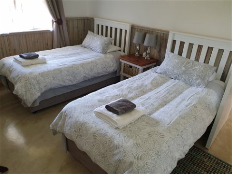 2nd bedroom Captains Cottage 2 single beds
