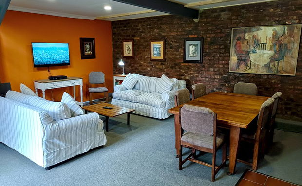 Bosman Suite Lounge and Dining Area at Clarens Country House