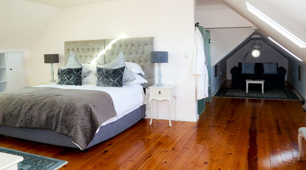 Diamond Honeymoon is an open-plan loft on the second floor, tucked beneath the roof. Designed mainly for honeymoon couples, it also suits families of up to five, with a baby cot available on request. Children will enjoy the reading nook and sleeper couch, both set within cosy alcoves. The bathroom includes a spacious Venetian shower, double vanity, and toilet. As the only room on this floor, it is our quietest option. Although well insulated, it also has reverse-cycle air conditioning for optimal comfort.