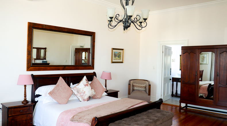 Located on the first floor, the Quartz Family Suite is the larger of our two Family Suites and accommodates up to six guests. The main bedroom includes an extra-long king-size bed, chest of drawers, spacious wardrobe, desk, and double sleeper couch. The second bedroom has twin beds, a coffee table, and a small wardrobe. The en-suite bathroom features a walk-in Venetian shower, double-basin vanity, and toilet. Located on the first floor, the Quartz Family Suite is the larger of our two Family Suites and accommodates up to six guests. The main bedroom includes an extra-long king-size bed, chest of drawers, spacious wardrobe, desk, and double sleeper couch. The second bedroom has twin beds, a coffee table, and a small wardrobe. The en-suite bathroom features a walk-in Venetian shower, double-basin vanity, and toilet.