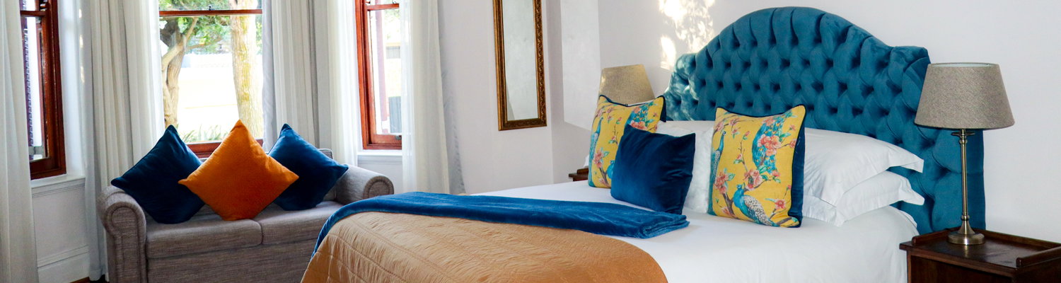 Sapphire is one of our ground-floor Family Rooms, comfortably accommodating a family of five with a king bed for parents, a cosy double sleeper couch and an optional baby cot. The king bed can be split into two single beds on request. The room is equipped with reverse-cycle air conditioning for optimal comfort.