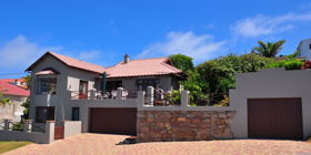 The north facing sea view deck is above the double garage.