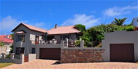 The north facing sea view deck is above the double garage.