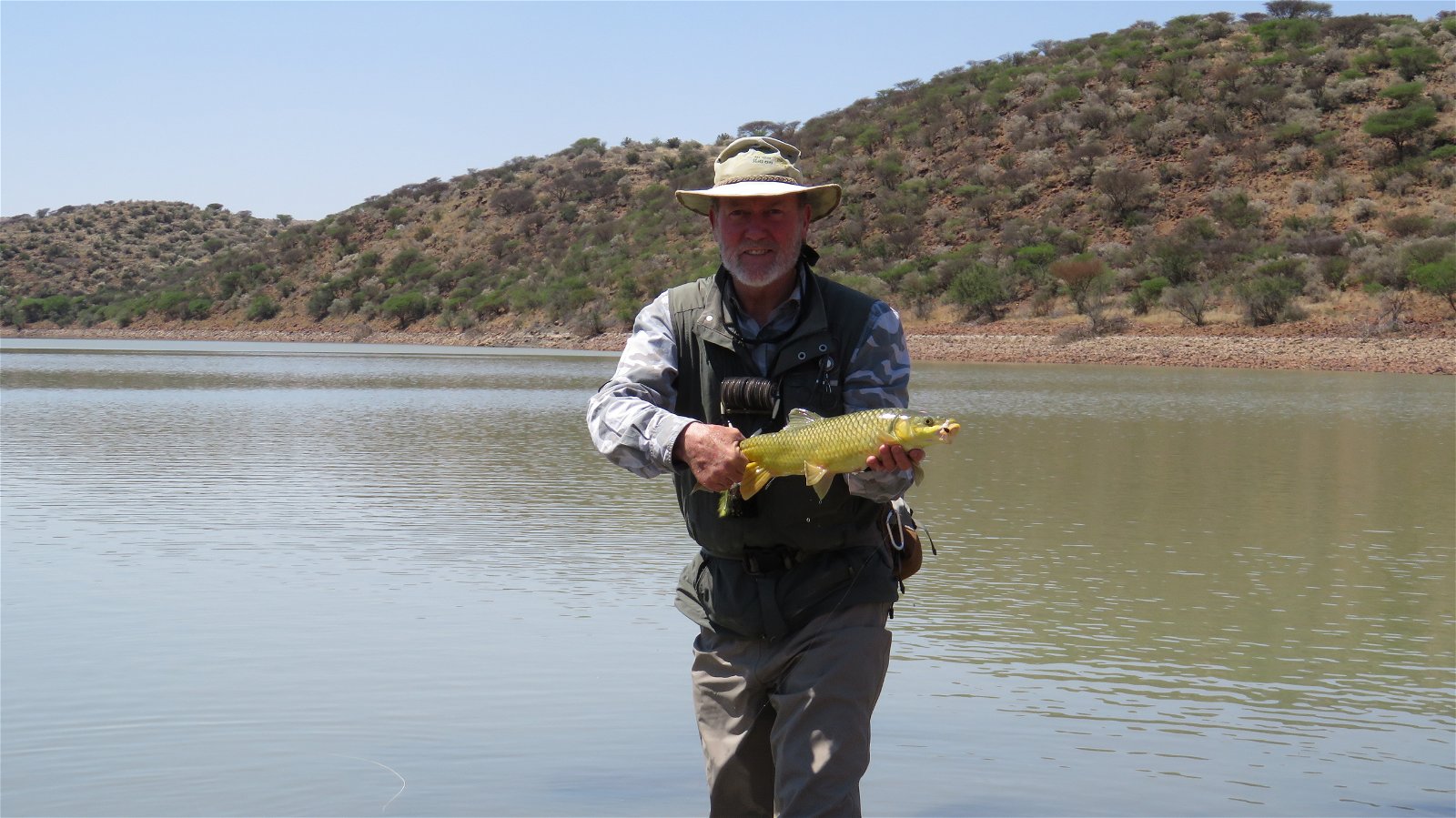 Alan Hobson with a smallmouth yellowfish, Wild Fly Fishing in the Karoo