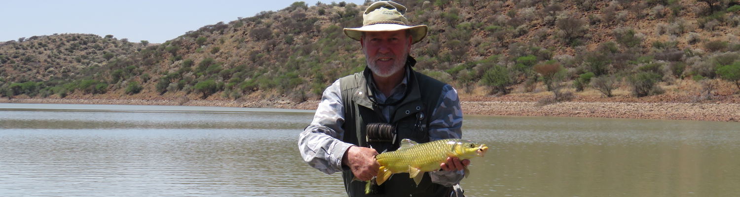 Alan Hobson with a smallmouth yellowfish, Wild Fly Fishing in the Karoo