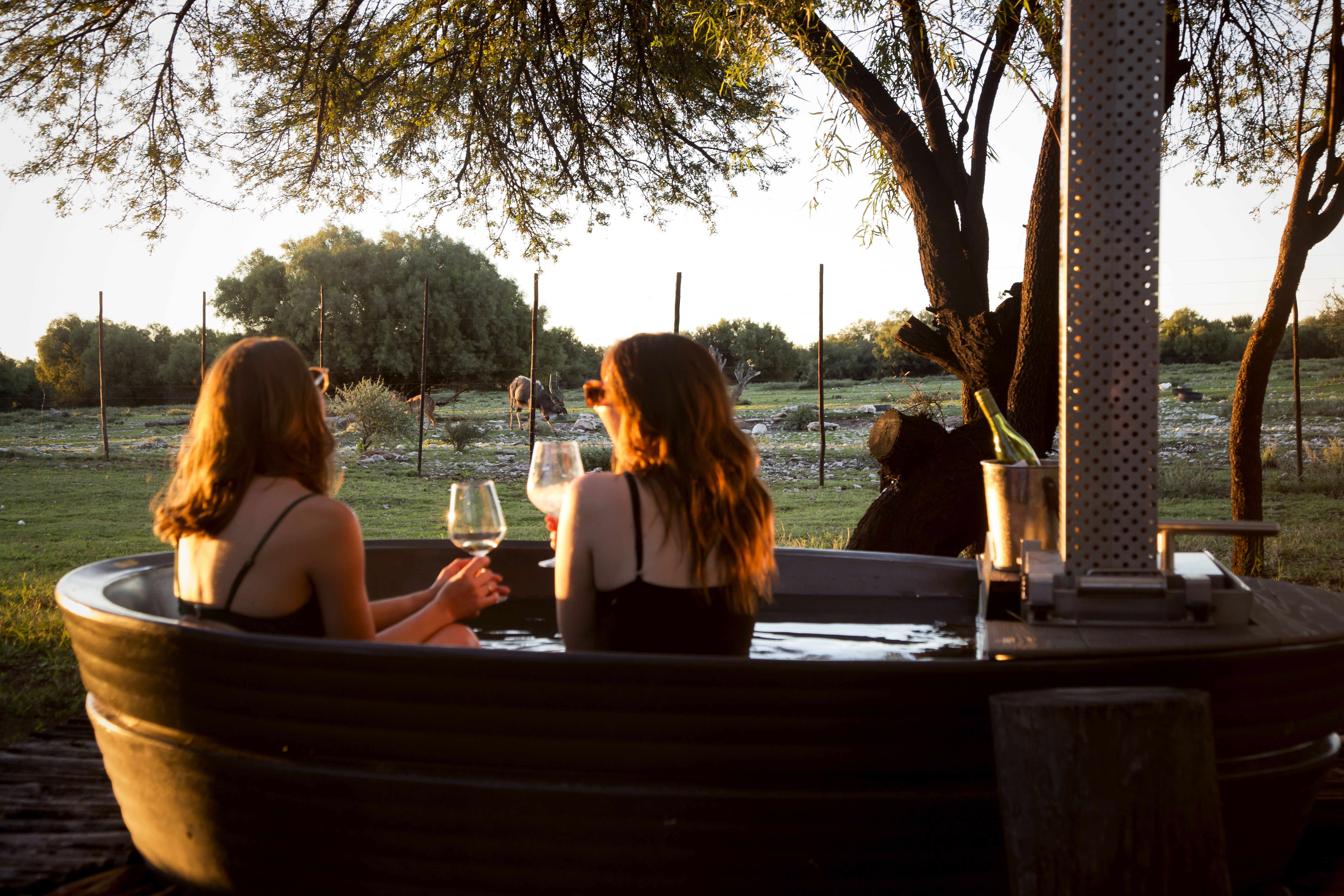 Discover ultimate relaxation with our hot tub overlooking a watering hole at our game lodge. Immerse yourself in luxury and nature, as you soak in breathtaking views while unwinding in our serene hot tub. Experience tranquility like never before at our game lodge.