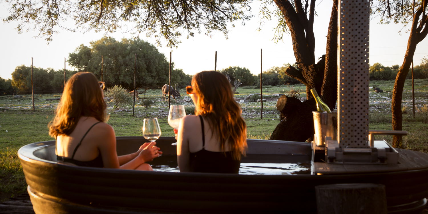 Discover ultimate relaxation with our hot tub overlooking a watering hole at our game lodge. Immerse yourself in luxury and nature, as you soak in breathtaking views while unwinding in our serene hot tub. Experience tranquility like never before at our game lodge.
