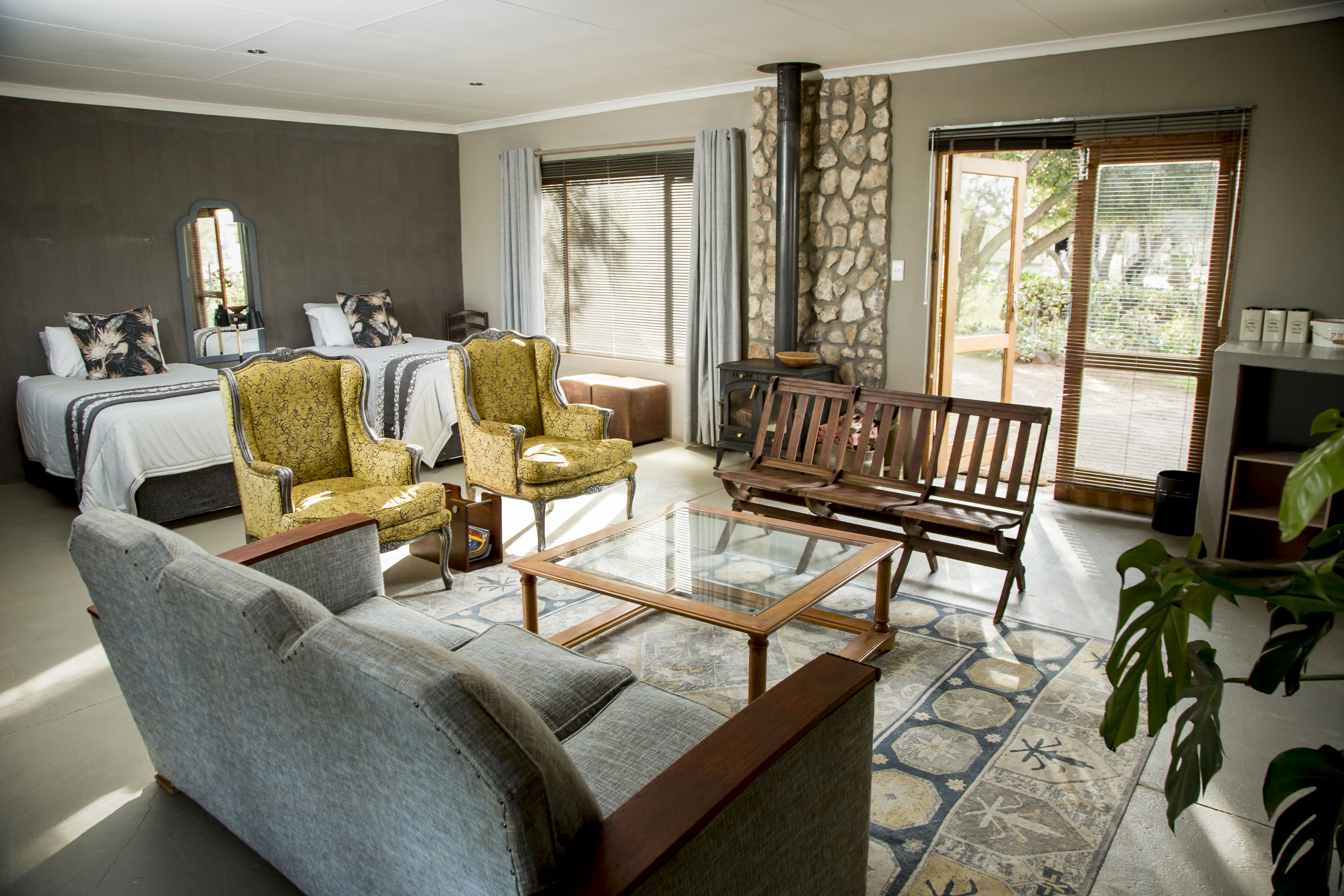 Discover luxury and seclusion in our One Bedroom Suite. With lavish furnishings, a spacious en-suite bathroom, and a private outside porch offering stunning views, indulge in the ultimate retreat. Book now for a getaway infused with the magic of the African wilderness.