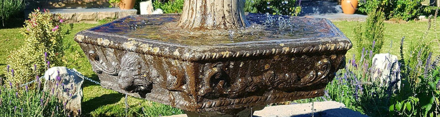 Trickling water fountain infront of Magrietjie and Bloureën chalets