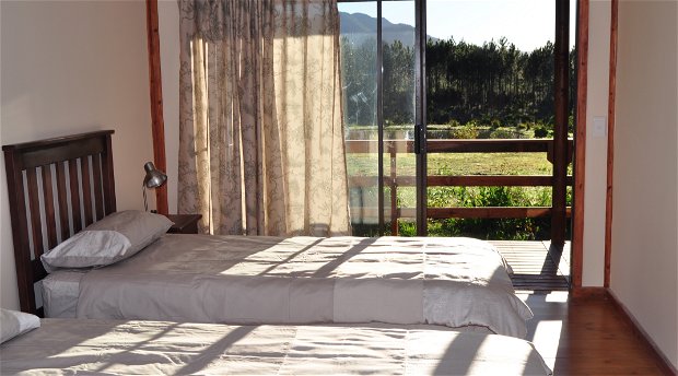 cottage accommodation garden route with twin beds mountain garden views