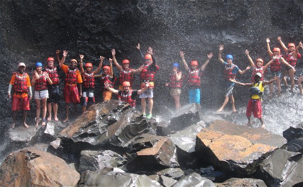 Bundu Rafting swimming under the Falls