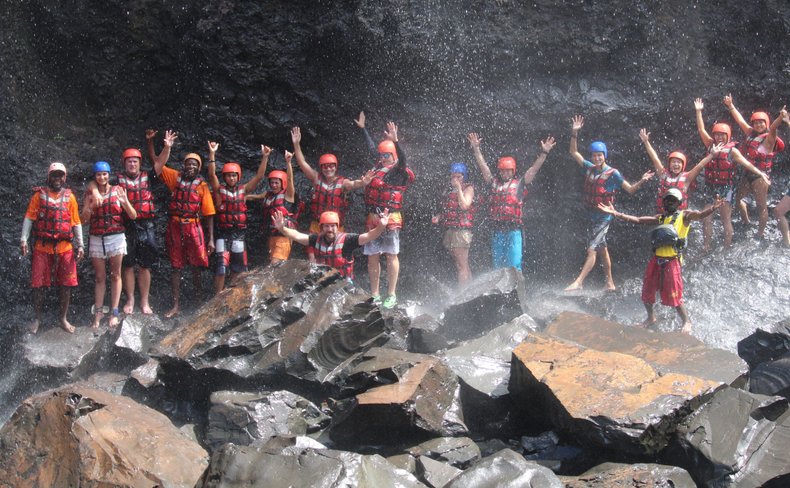 Bundu Rafting swimming under the Falls