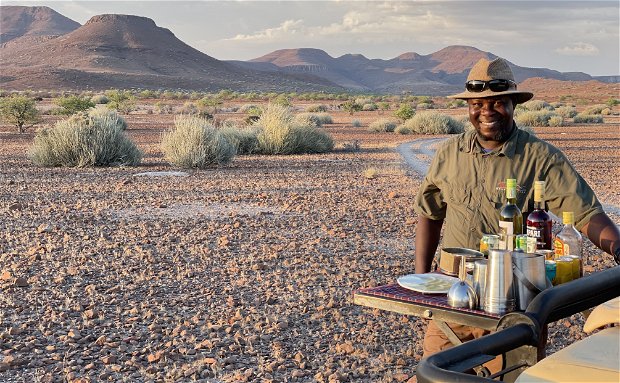 Sundowner drinks at Etendeka Mountain Lodge Namibia