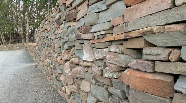 Old stone walls have been restored and new walls packed in the same Karoo style. Old stone walls have been restored and new walls packed in the same Karoo style.