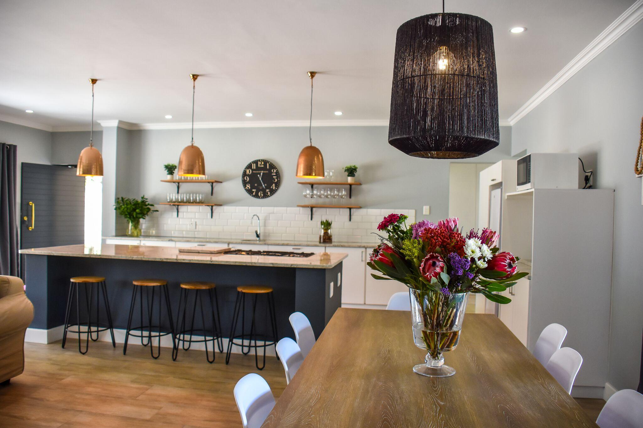 The central island is a great feature with gas hob and seating area