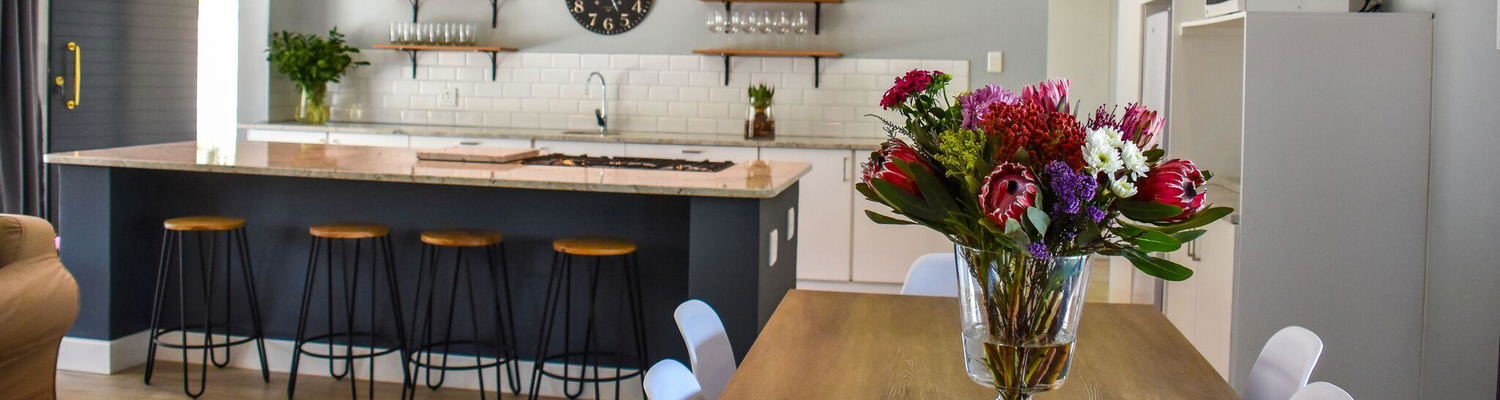 The central island is a great feature with gas hob and seating area